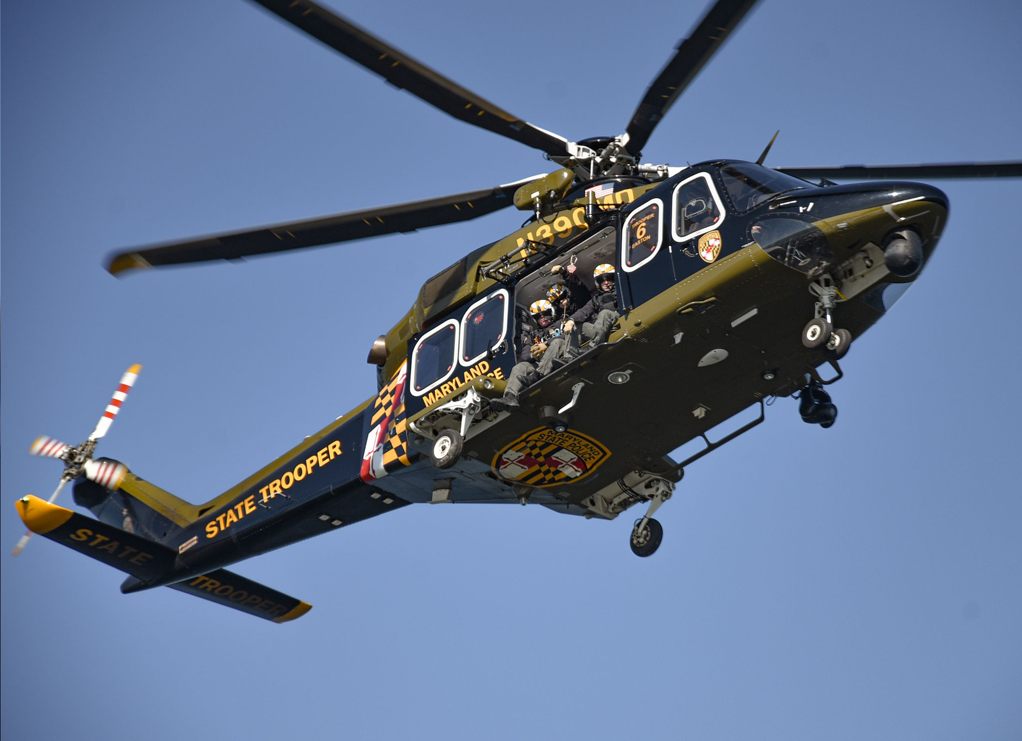 Crew from the helicopter waiting for the pick up on deck to be ready